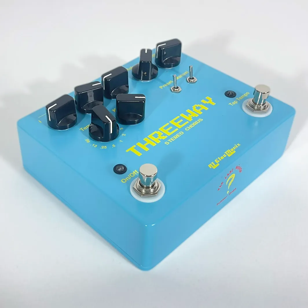 Front view of a light blue The Last Ménage Threeway stereo chorus pedal.