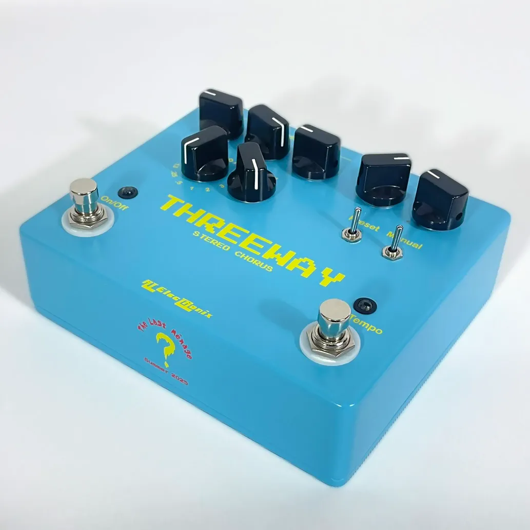 Front view of a light blue The Last Ménage Threeway stereo chorus pedal.