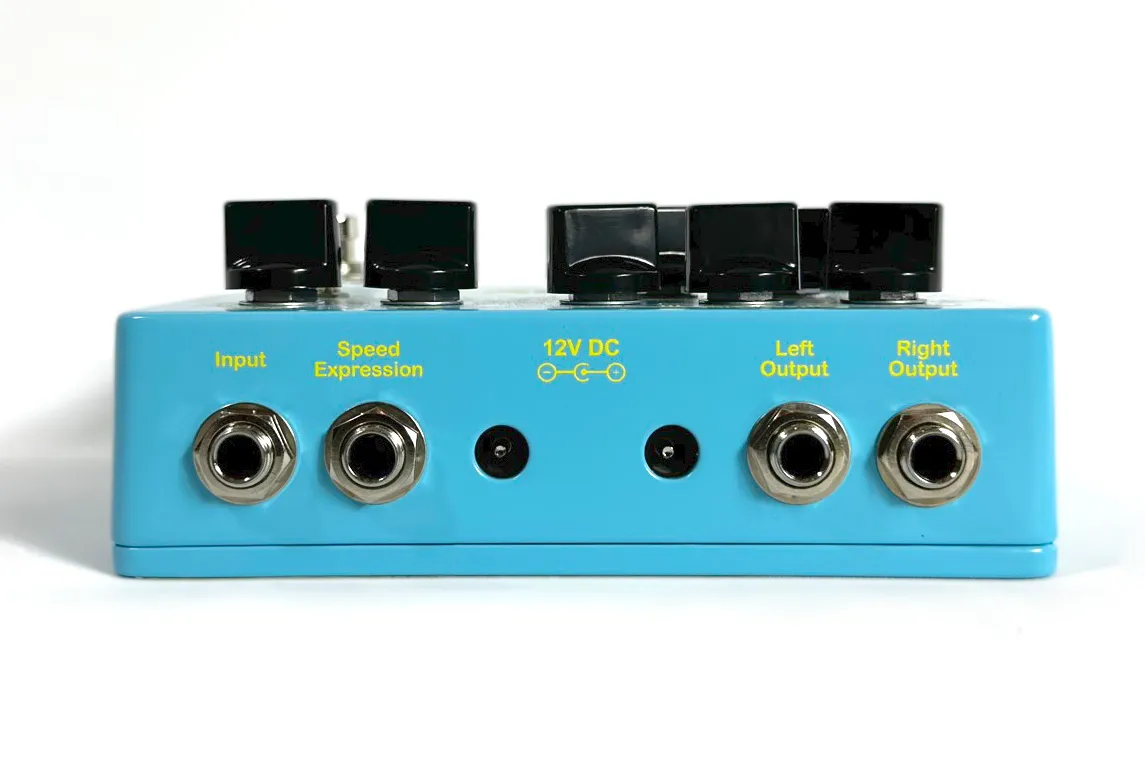 Front view of a light blue The Last Ménage Threeway stereo chorus pedal.